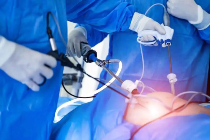 Gynecologist explaining laparoscopic surgery procedure for women